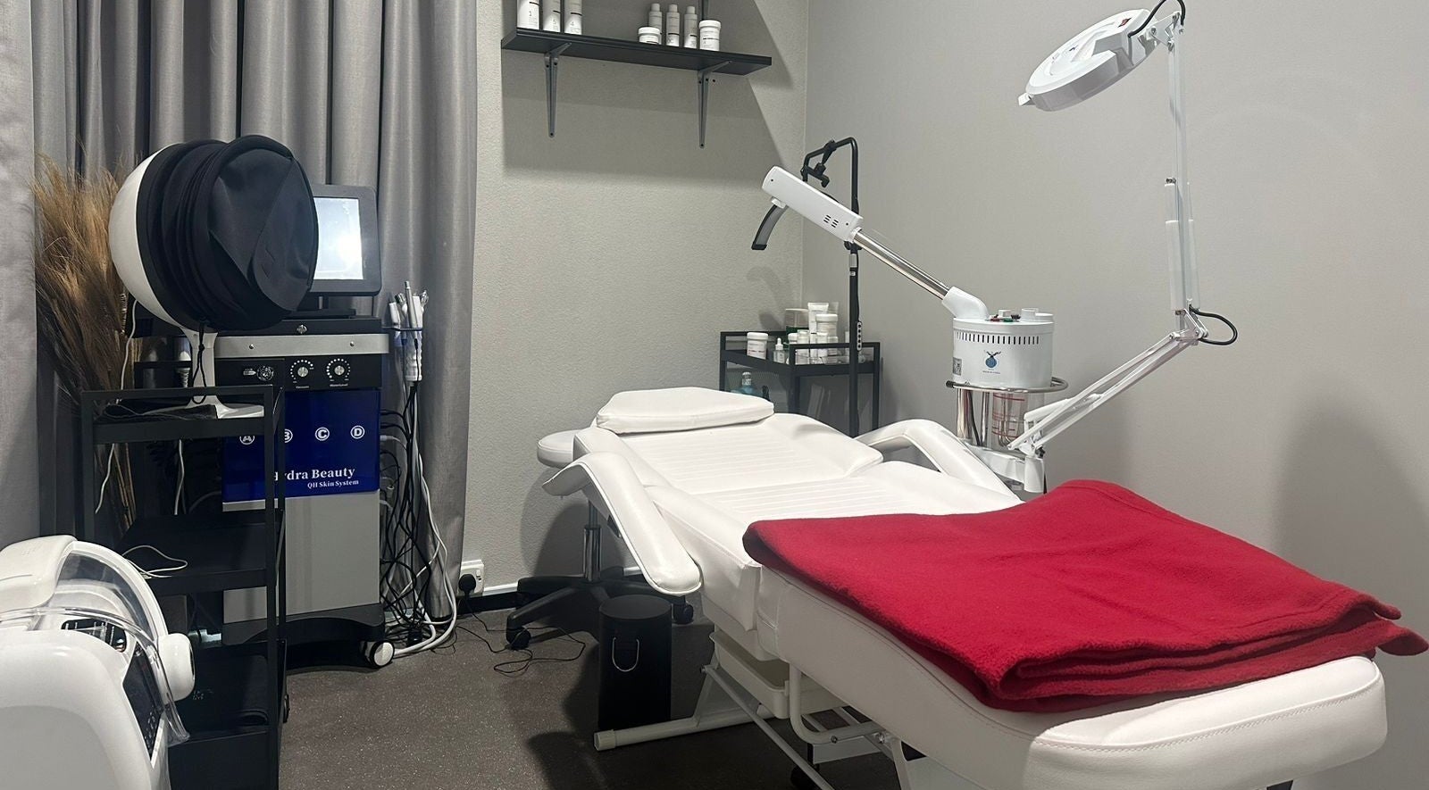 Modern treatment room at My Face, Riyadh, Riyadh Province, SA, featuring a spa bed and skincare equipment.