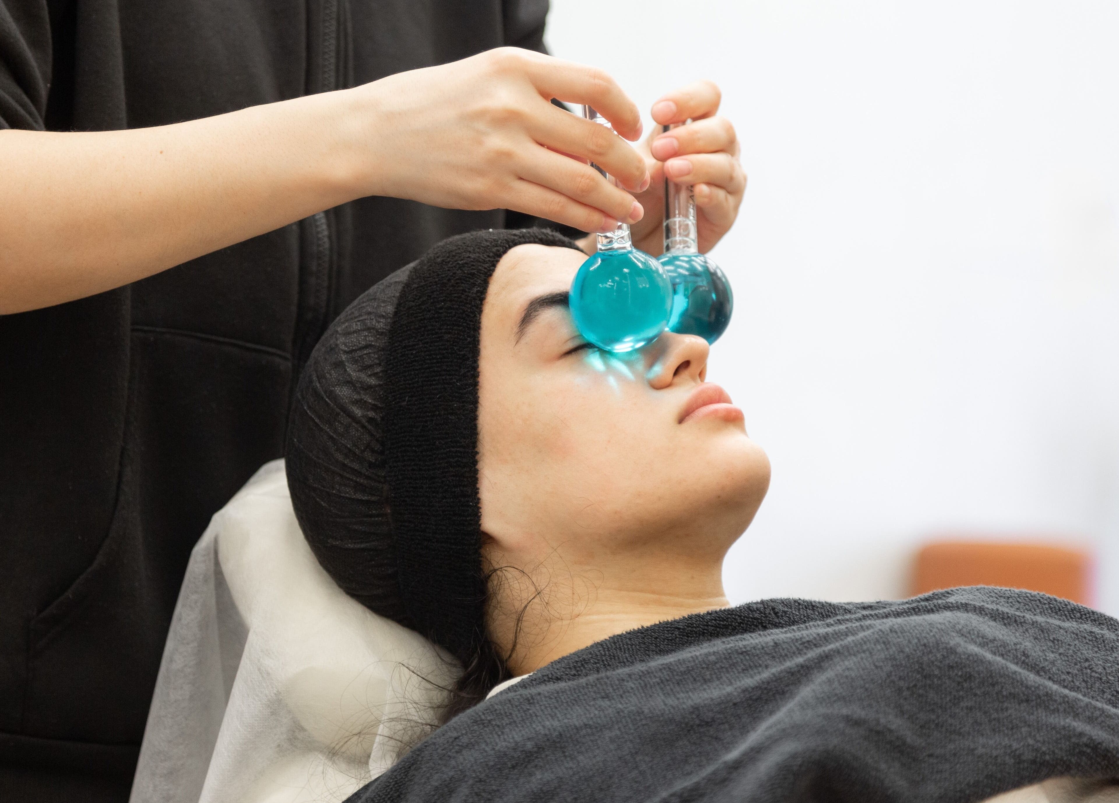 Facial treatment at My Face in Riyadh, Riyadh Province, SA with serene eye cooling globes.