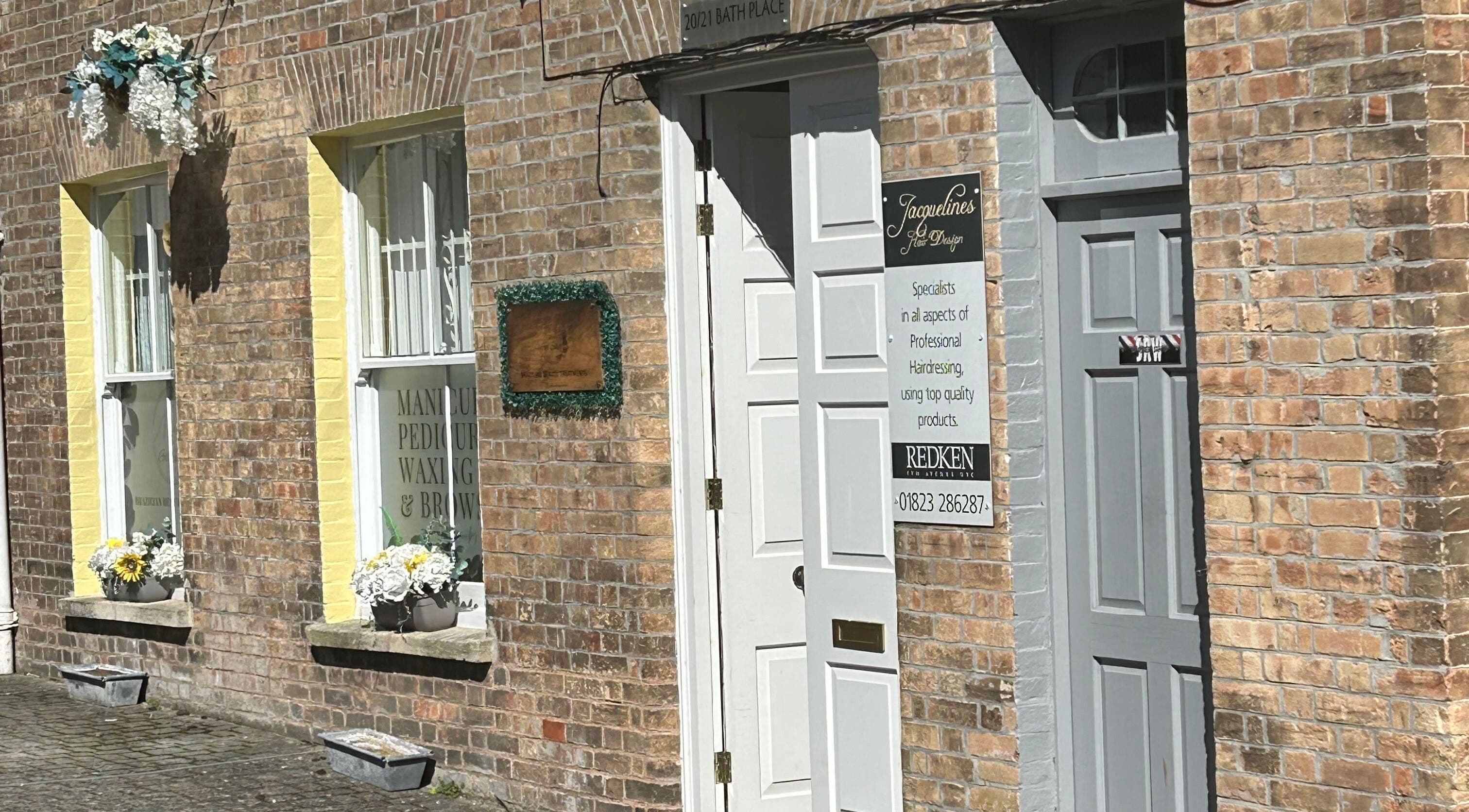 Exterior of Beauty Worx in Taunton, England, GB with brick facade and welcoming entrance.