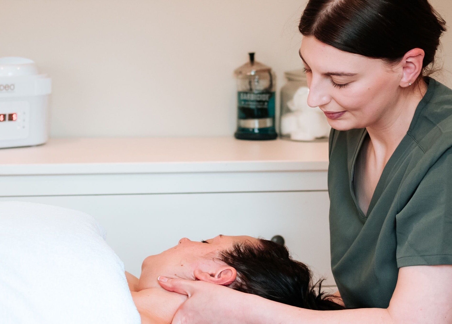 Therapist at Bare Faced by Elle in Middlesbrough, England, GB, providing a soothing massage.