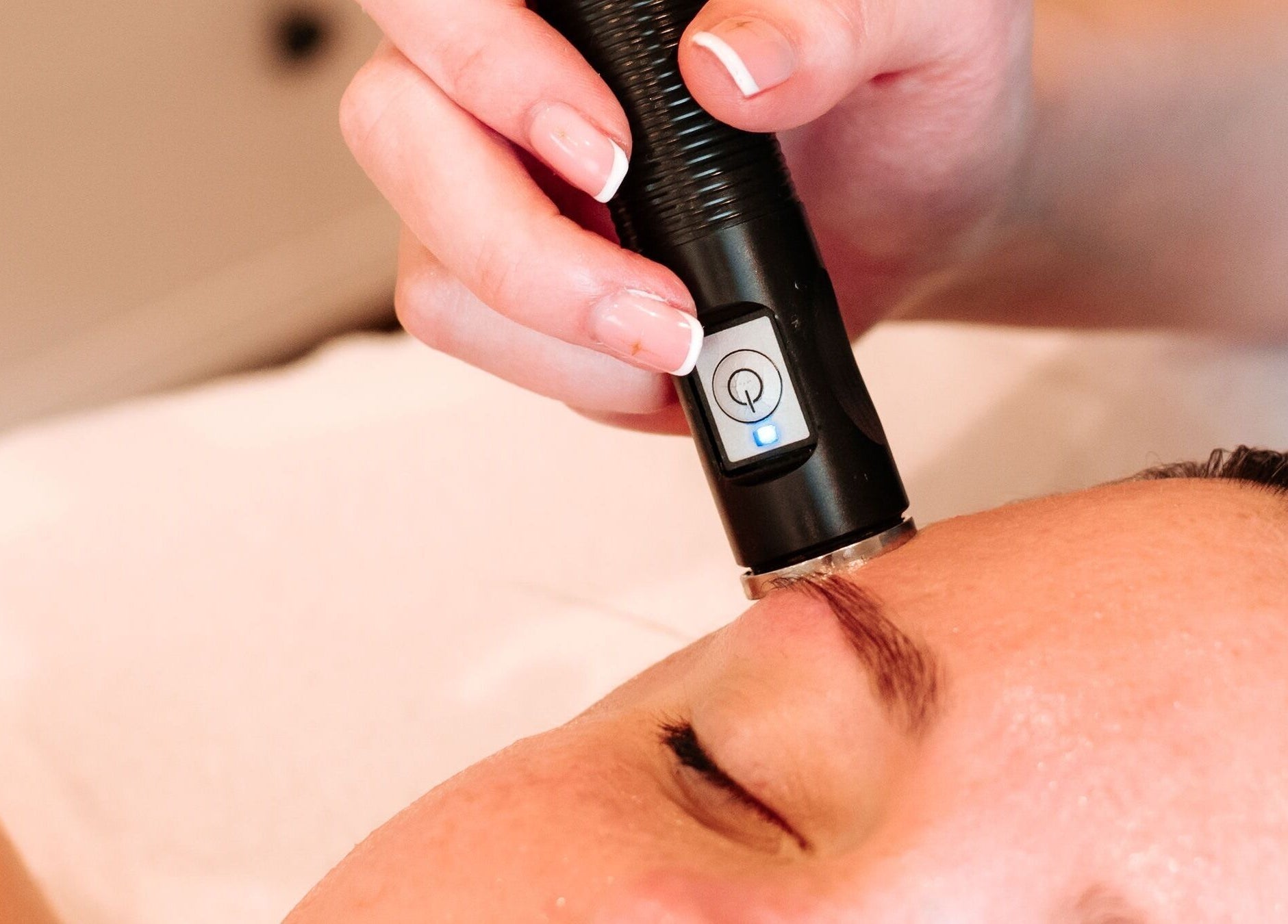 Facial treatment in progress at Bare Faced by Elle, Middlesbrough, England, GB, enhancing skin radiance.