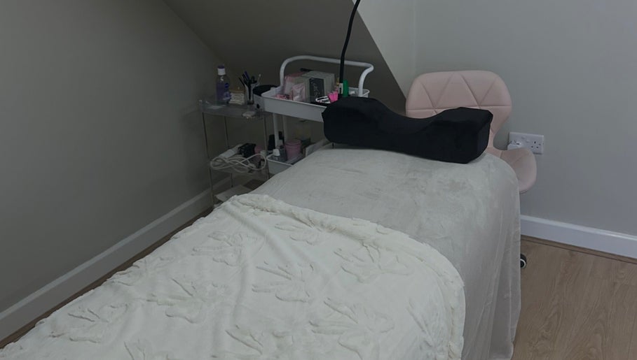 Relaxing spa treatment room at JLP Studio, Morpeth, England, GB. Inviting bed and organized tools.