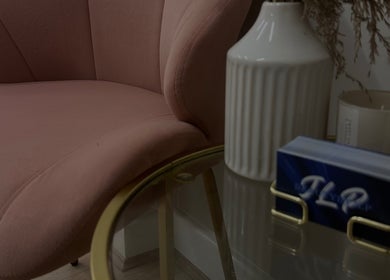 Elegant pink chair and decor at JLP Studio in Morpeth, England, GB showcasing a serene ambiance.