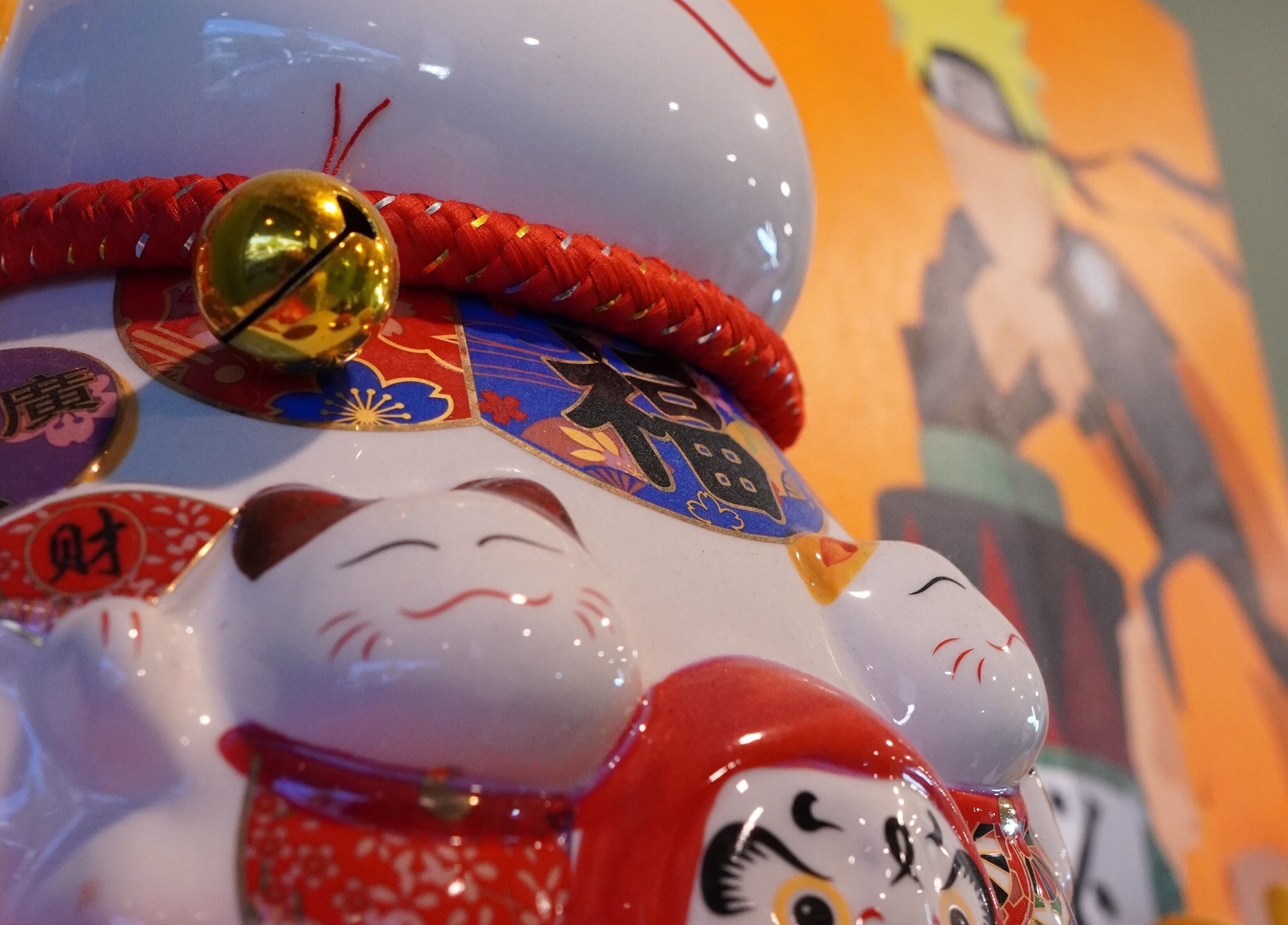 Charming cat figurines displayed at Stevo’s Barbershop, Moorooka, Queensland, AU, adding a unique touch.