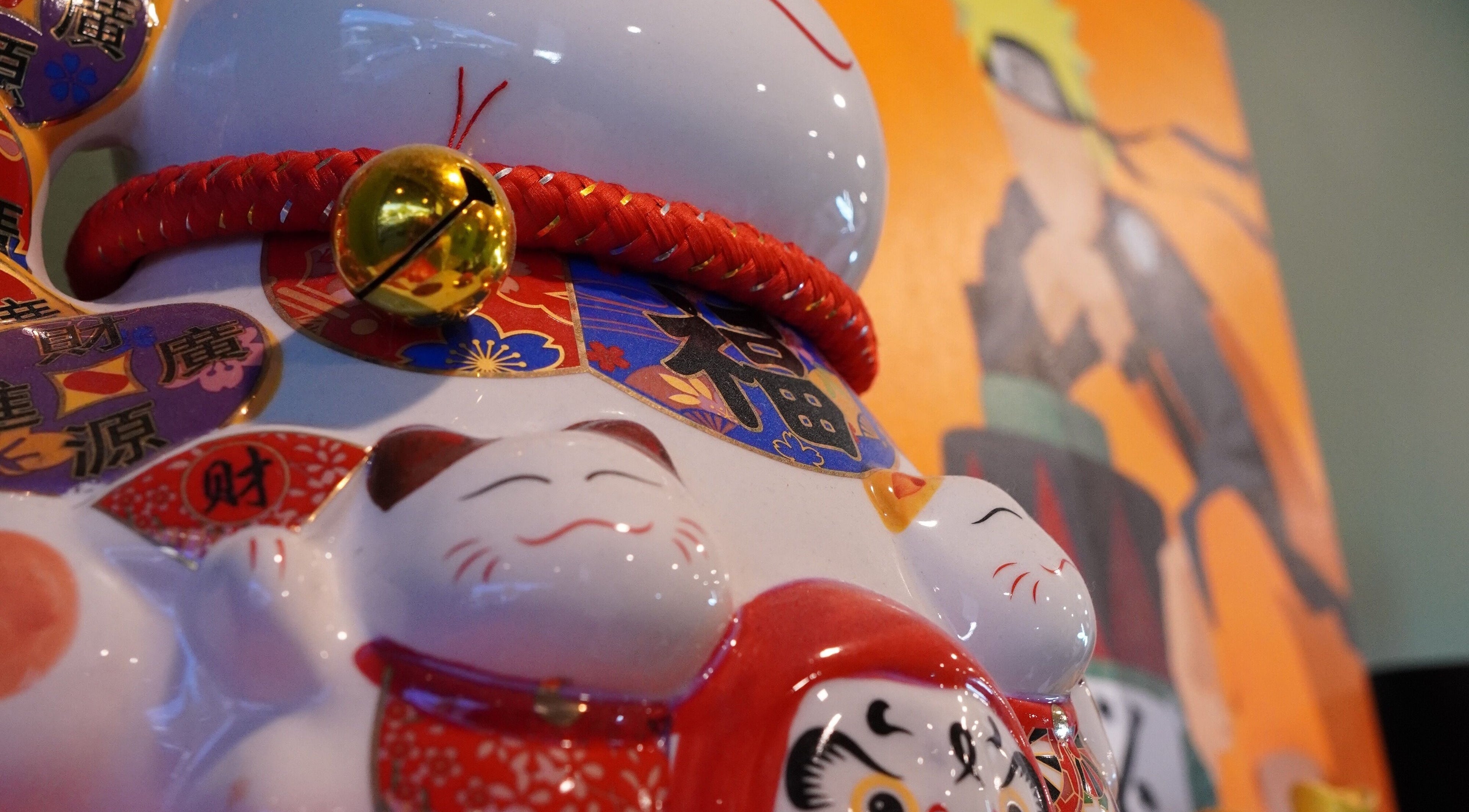 Charming cat figurines displayed at Stevo’s Barbershop, Moorooka, Queensland, AU, adding a unique touch.