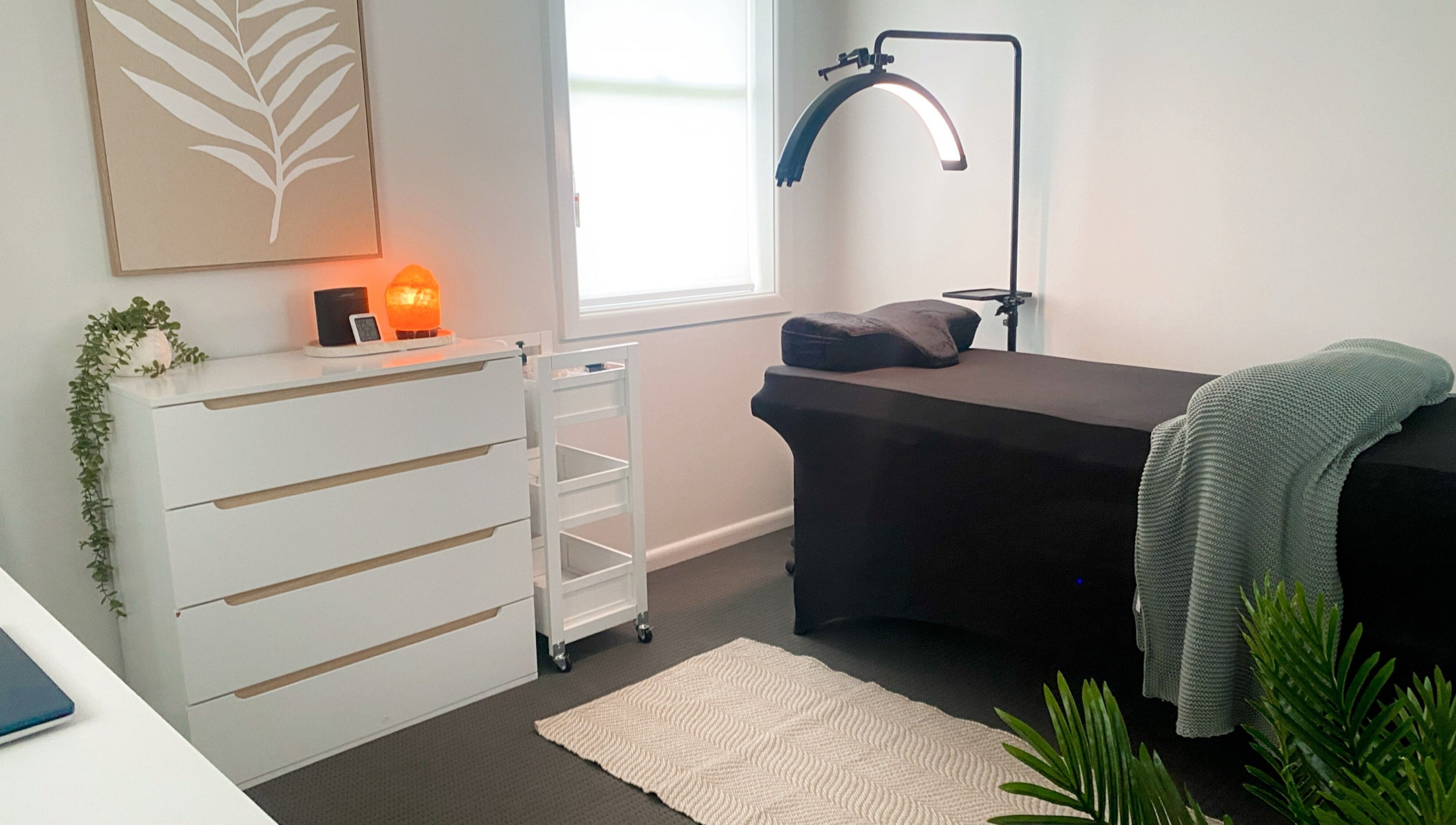 Elegant treatment room at The Lash Abode by Jade, Berkeley, New South Wales, AU, featuring a cozy setup.