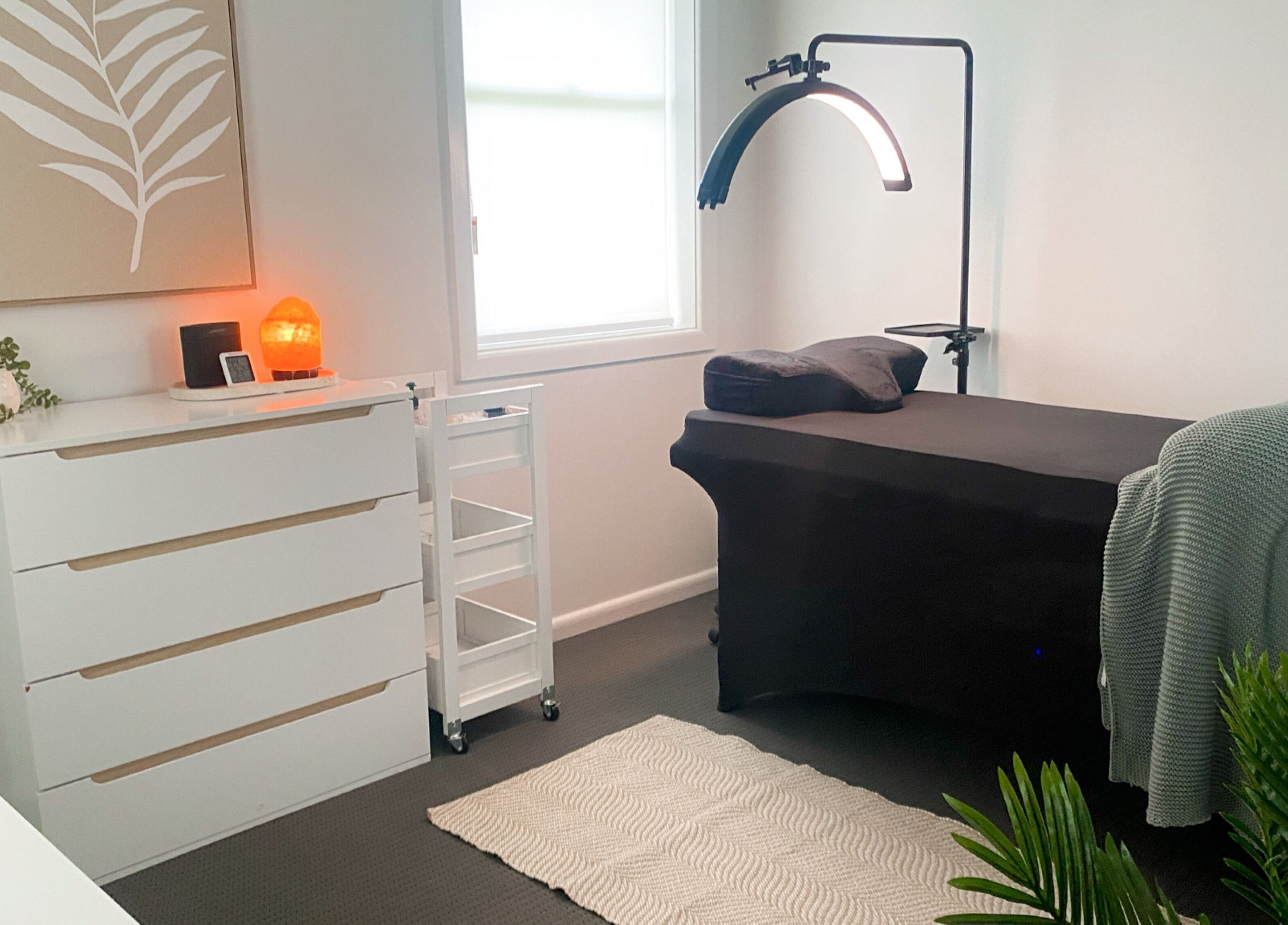 Elegant treatment room at The Lash Abode by Jade, Berkeley, New South Wales, AU, featuring a cozy setup.
