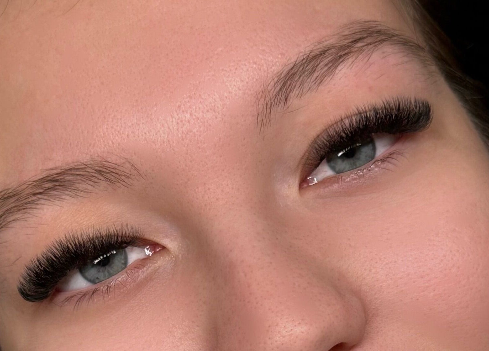 Closeup of elegant lash extensions at The Lash Abode by Jade, Berkeley, New South Wales, AU.