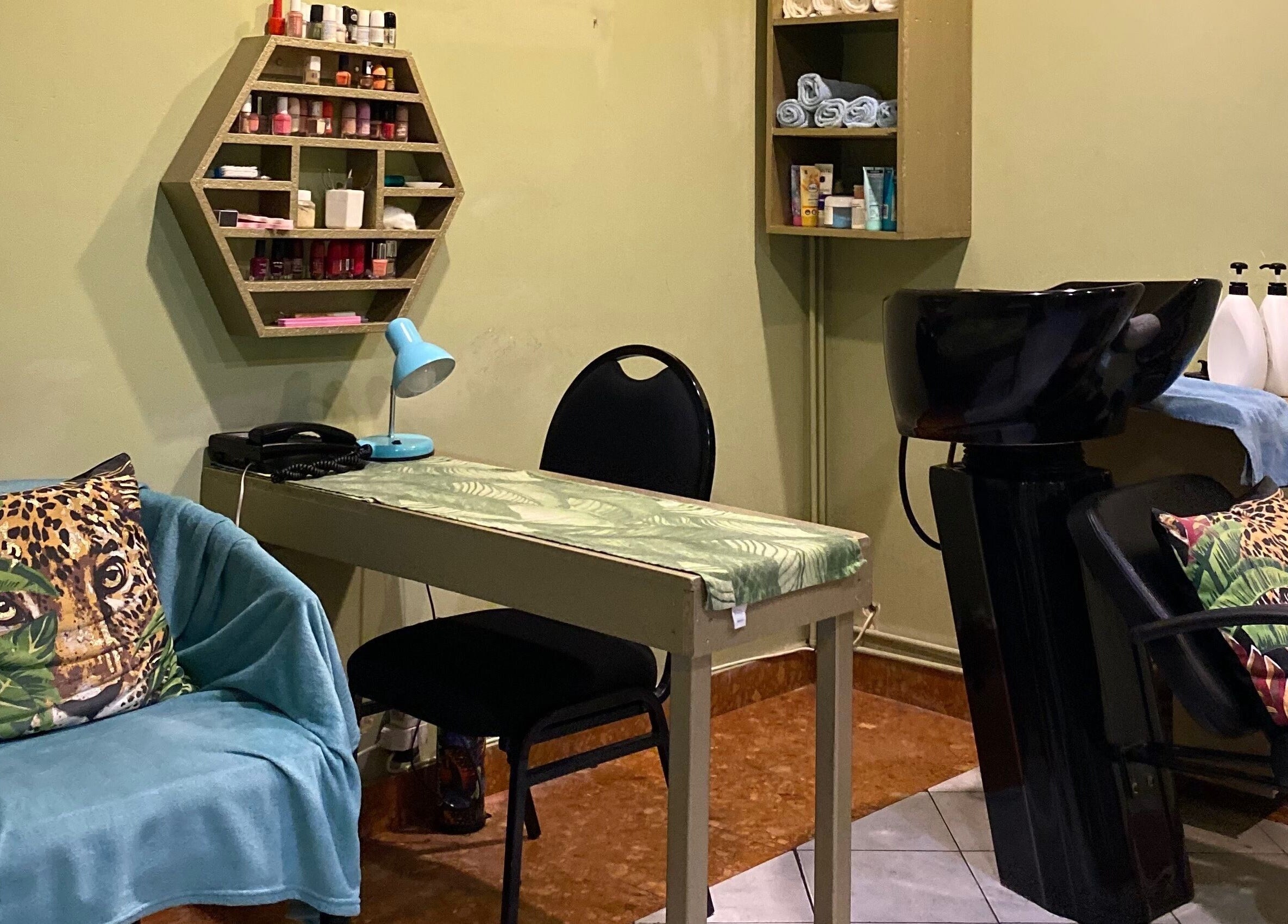 Cozy salon corner with vibrant decor at Salon Tossy Hair and Body, Windhoek, Khomas Region, NA.