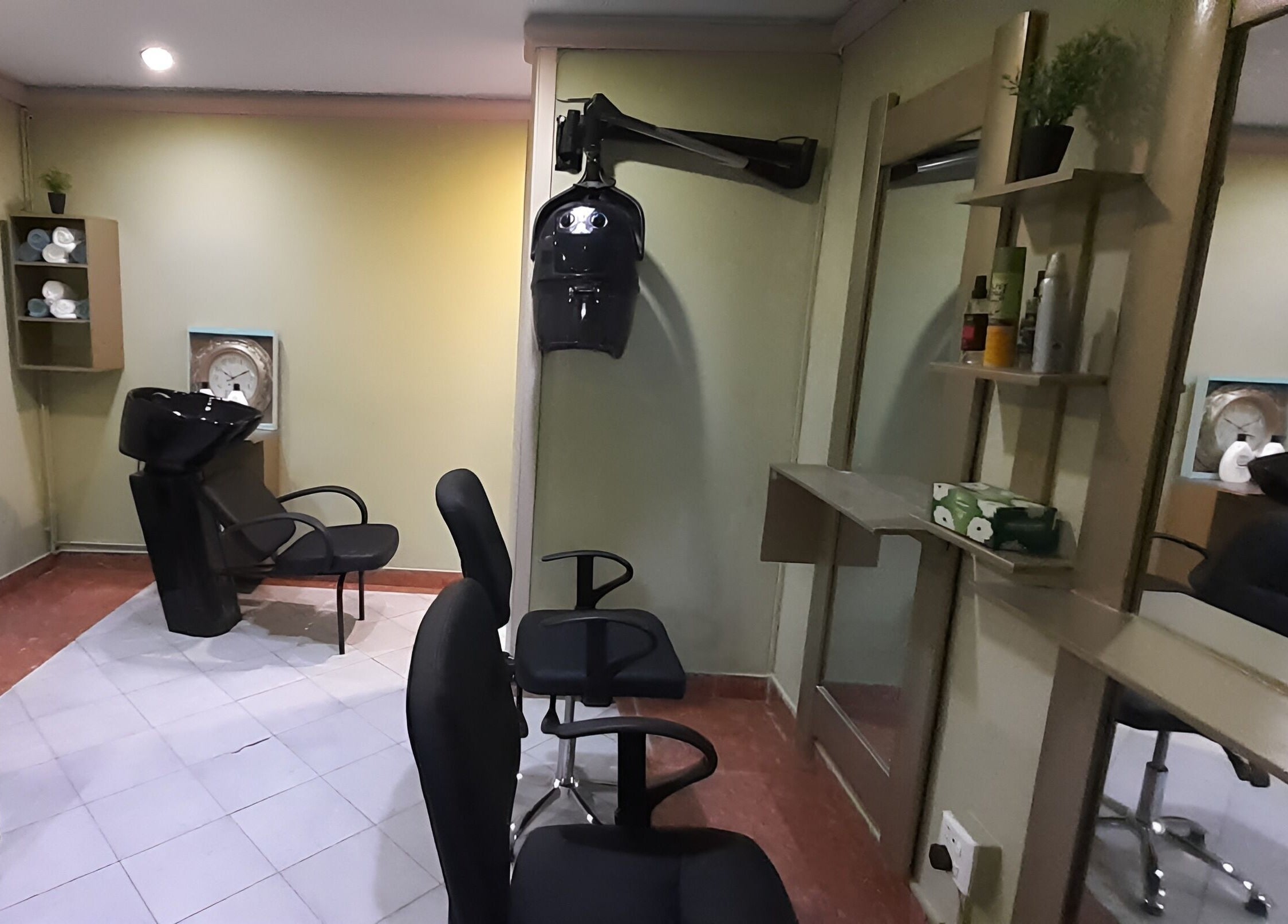 Interior of Salon Tossy Hair and Body in Windhoek, Khomas Region, NA with modern hair styling stations.