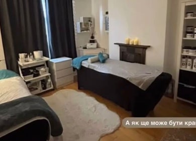 Cozy therapy room at Shape & Slim Massage Studio, Leicester, England, GB with massage tables and calming decor.