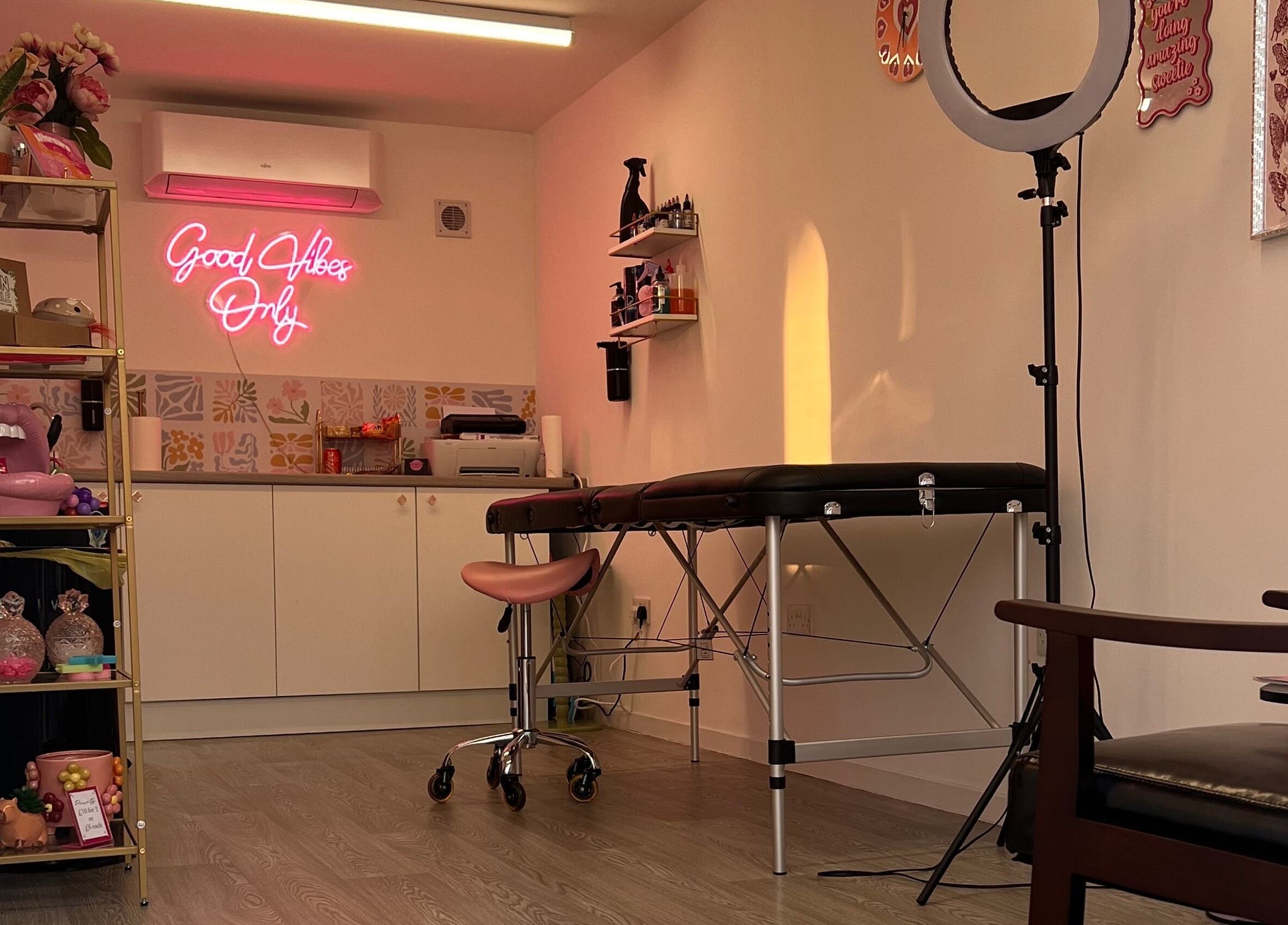 Chloe Duncan Tattoo studio in Rochester, England, GB with modern decor and tattoo station.