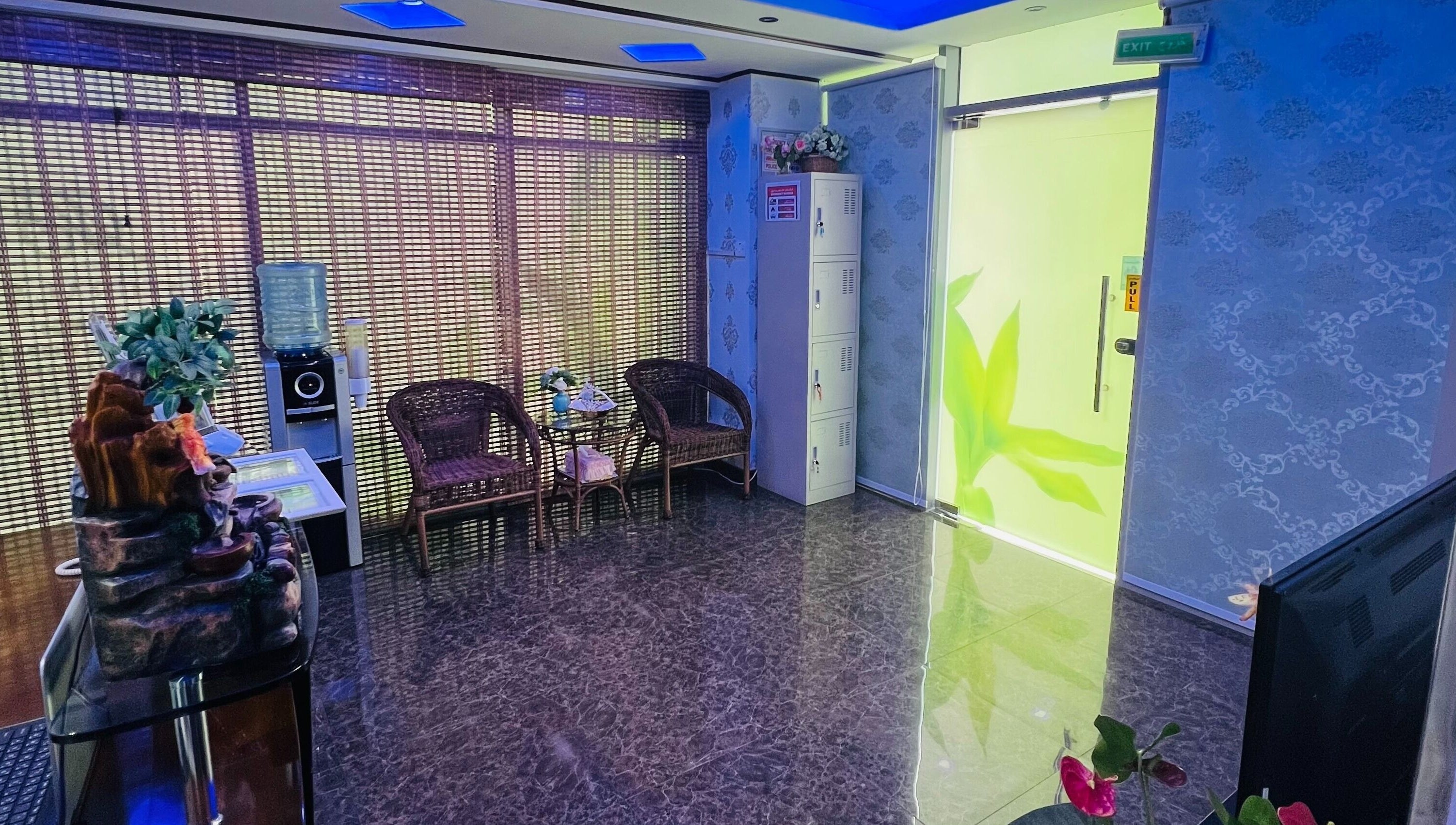 Welcoming lobby at Natural Spa DMCC in Dubai, Dubai, AE, featuring cozy wicker chairs and soothing decor.