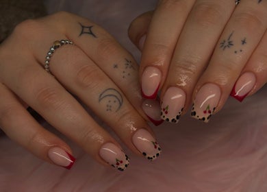 Stylish nail art at Jennifer Audrey Nails & Beauty in Thurmaston, England, GB. Featuring unique cherry design.