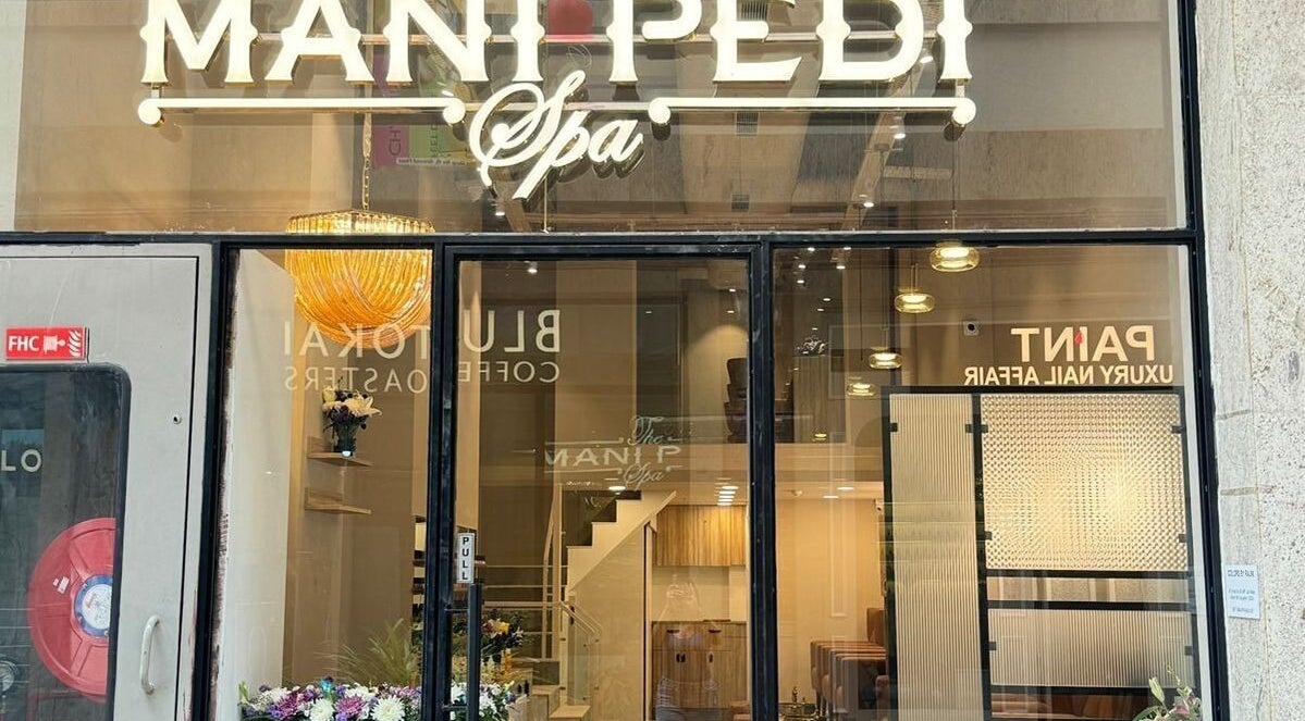 Front view of The Mani Pedi Spa, AIPL Joy Street in Gurugram, Haryana, IN, showcasing modern design.