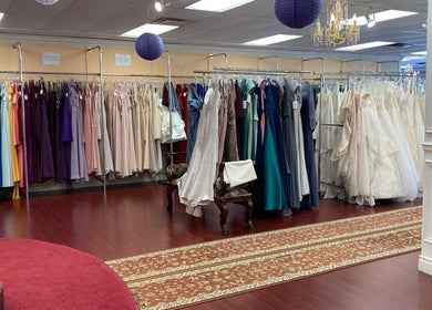 Elegant bridal and evening gowns at Best for Bride Barrie, Barrie, Ontario, CA, showcasing a vibrant collection.