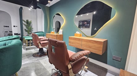 Elegant interior of The Elenas Beauty Salon, Dubai, Dubai, AE featuring plush chairs and upscale decor.