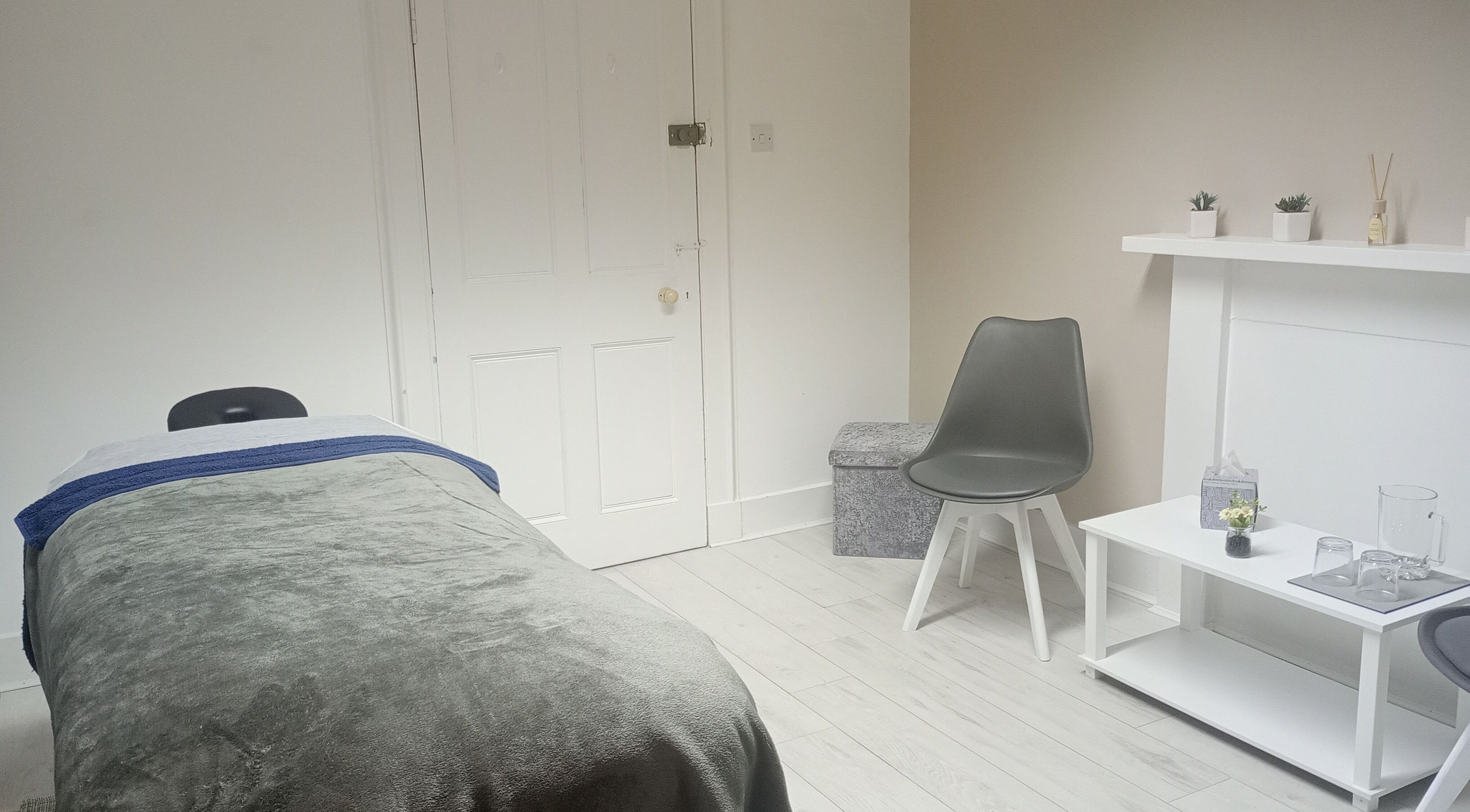 Relaxing massage room at The Small Massage Room, Thurso, Highlands, GB with soothing decor.
