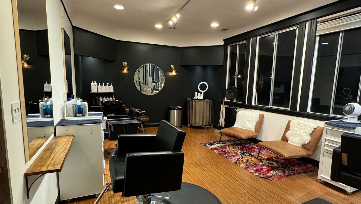 Modern salon interior at Code Salon in San Francisco, California, US, featuring stylish decor and comfy seating.