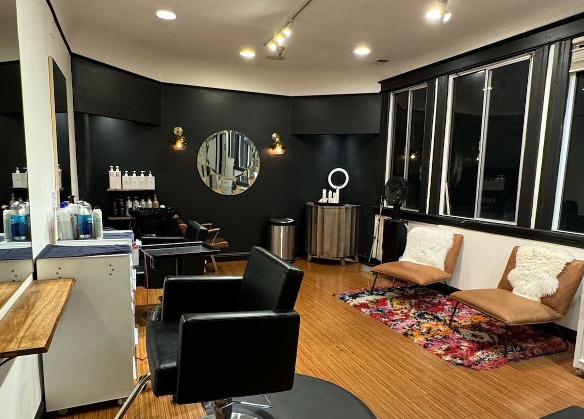 Modern salon interior at Code Salon in San Francisco, California, US, featuring stylish decor and comfy seating.