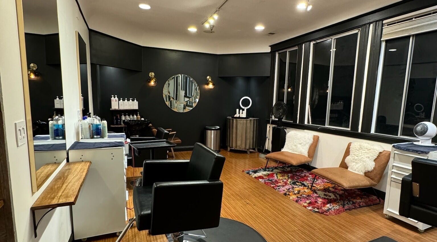 Modern salon interior at Code Salon in San Francisco, California, US, featuring stylish decor and comfy seating.
