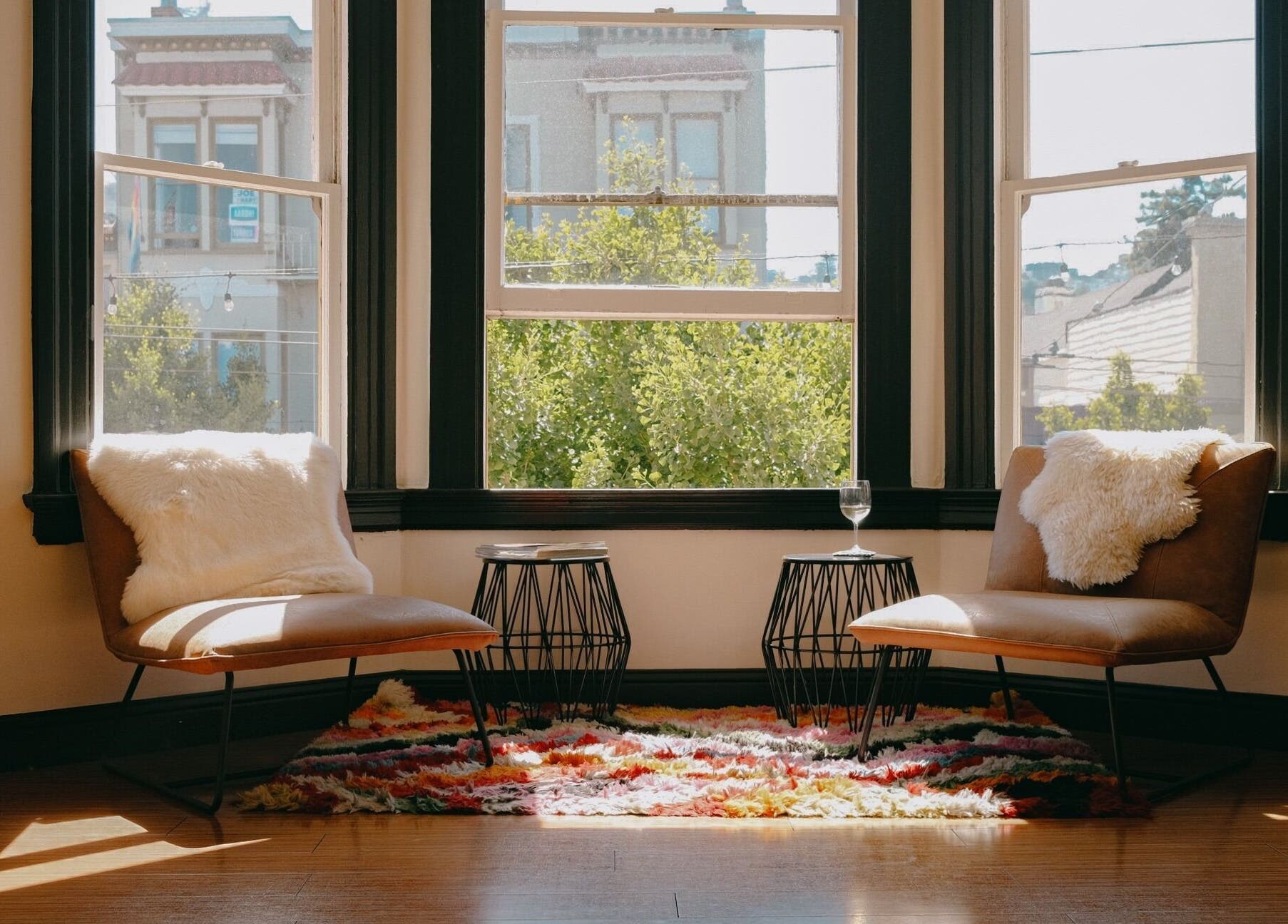 Elegant seating area at Code Salon, San Francisco, California, US, showcasing plush chairs and vibrant decor.