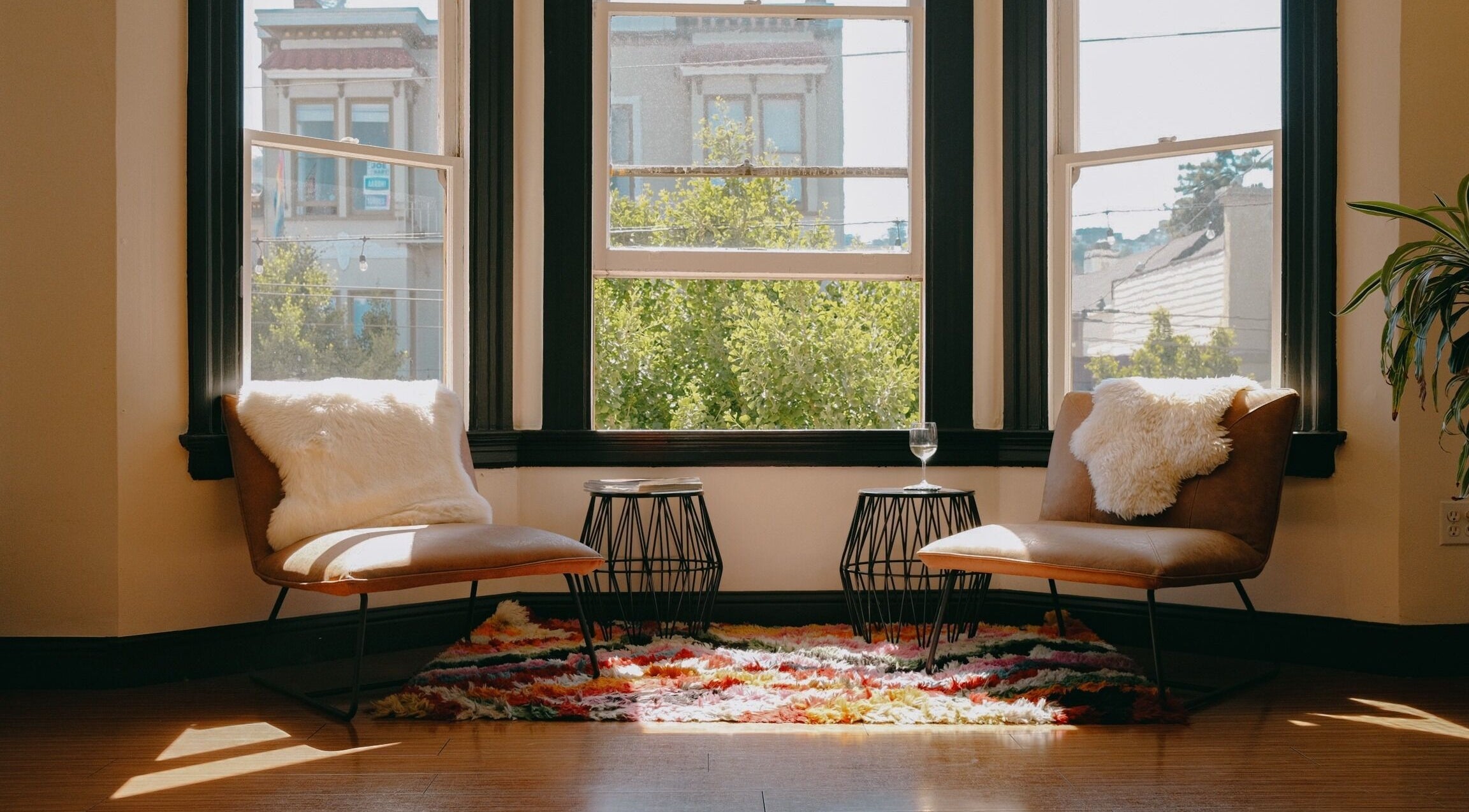 Elegant seating area at Code Salon, San Francisco, California, US, showcasing plush chairs and vibrant decor.