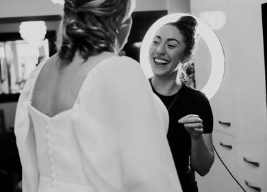 Lauren O Sullivan Makeup artist with a bride in Killarney, County Kerry, IE, creating a joyful wedding look.