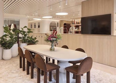 Stylish meeting area at The Colour House, Sydney, New South Wales, AU featuring modern decor and lush greenery.