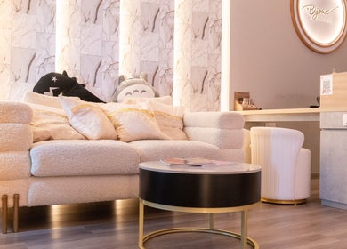 Inviting lounge at Bijoux Nail Studio in Singapore, Singapore, SG with plush seating and elegant decor.
