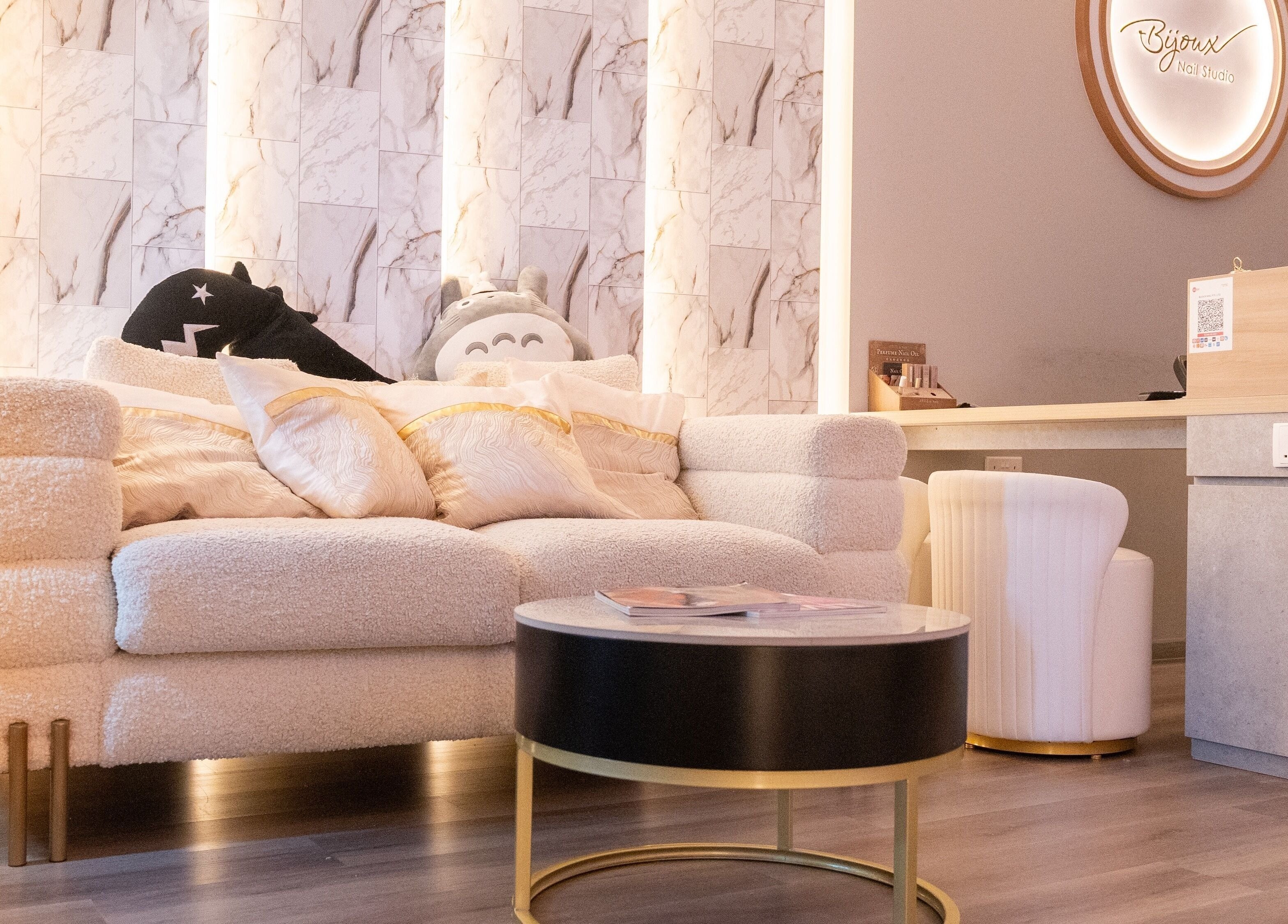 Inviting lounge at Bijoux Nail Studio in Singapore, Singapore, SG with plush seating and elegant decor.