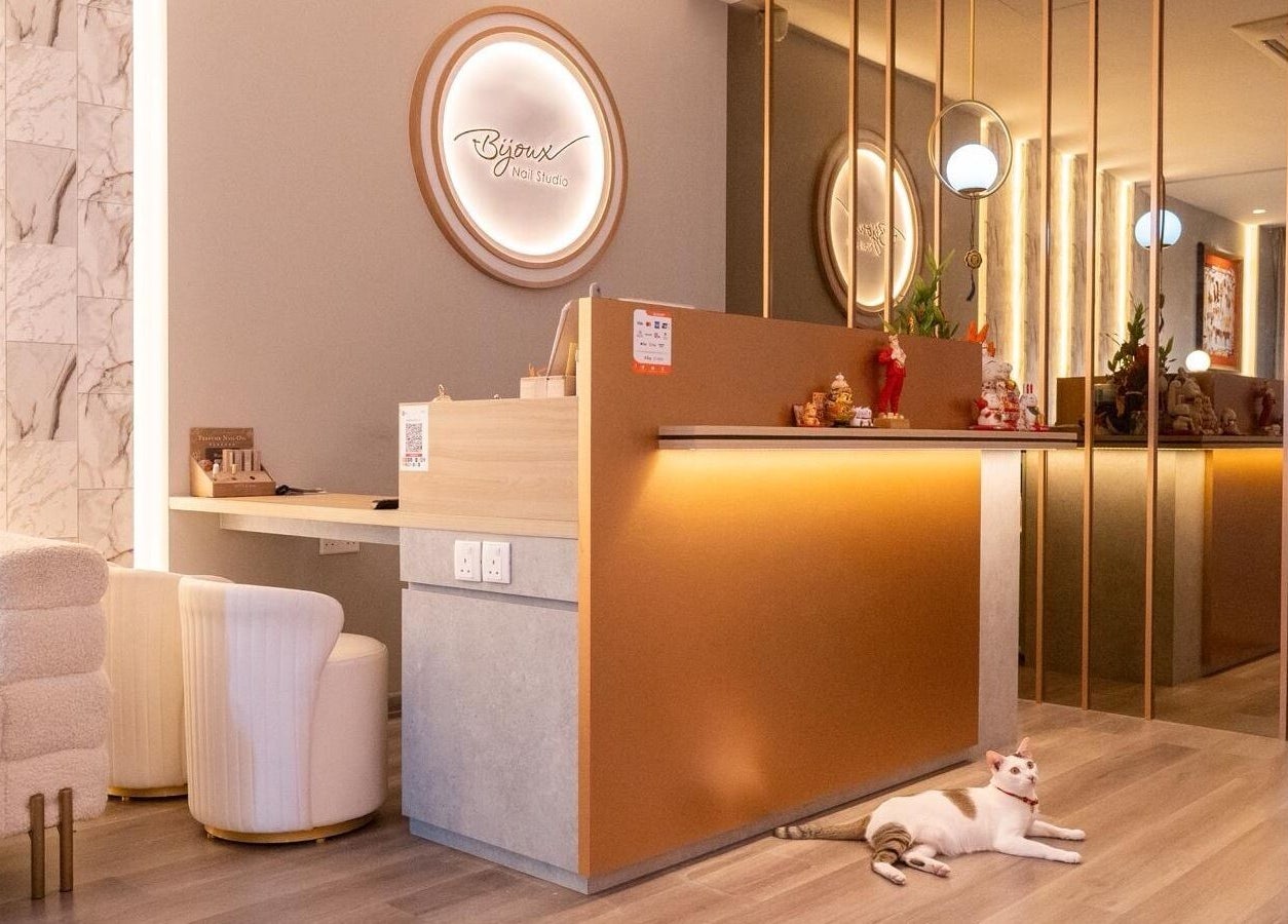 Elegant interior of Bijoux Nail Studio in Singapore, Singapore, SG, featuring modern decor and cozy seating.