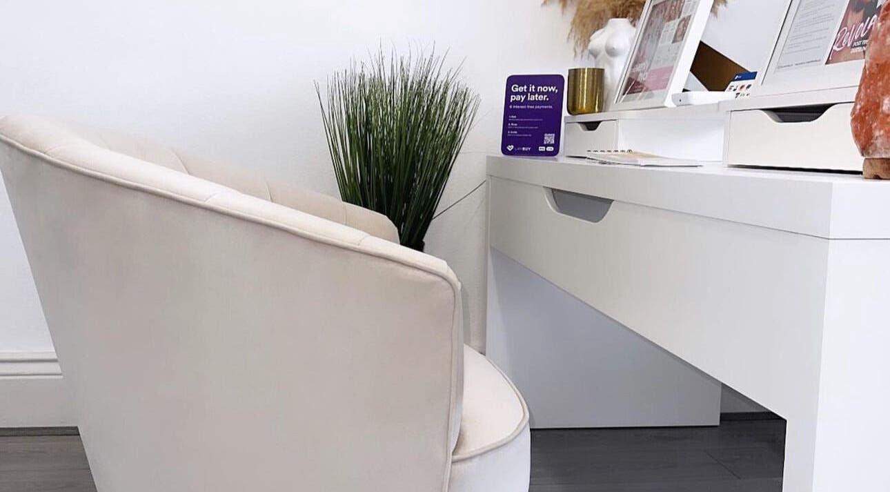 Modern workspace with chair and plants at Sculpt Aesthetics, Sunderland, England, GB.
