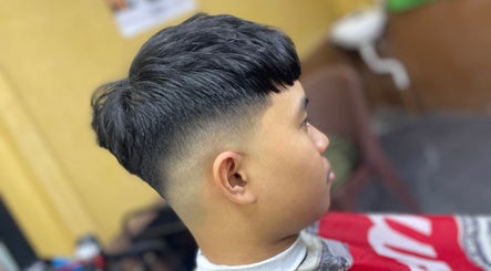 Close-up of a stylish taper haircut at Eden Barber, Ulu Tiram, Johor, MY. Perfect for a modern look.