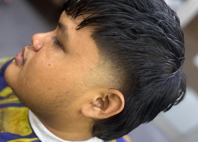 Close-up of a trendy fade haircut at Eden Barber, Ulu Tiram, Johor, MY.