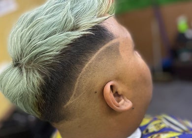 Modern mint fade haircut at Eden Barber in Ulu Tiram, Johor, MY showcasing expert hair styling.