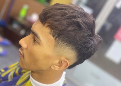 Close-up of a fade haircut at Eden Barber in Ulu Tiram, Johor, MY, showcasing expert styling and precision.
