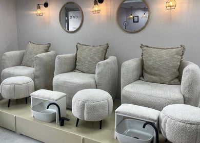 Luxxe Beauty Spot pedicure chairs with plush seats in Roodepoort, Gauteng, ZA.