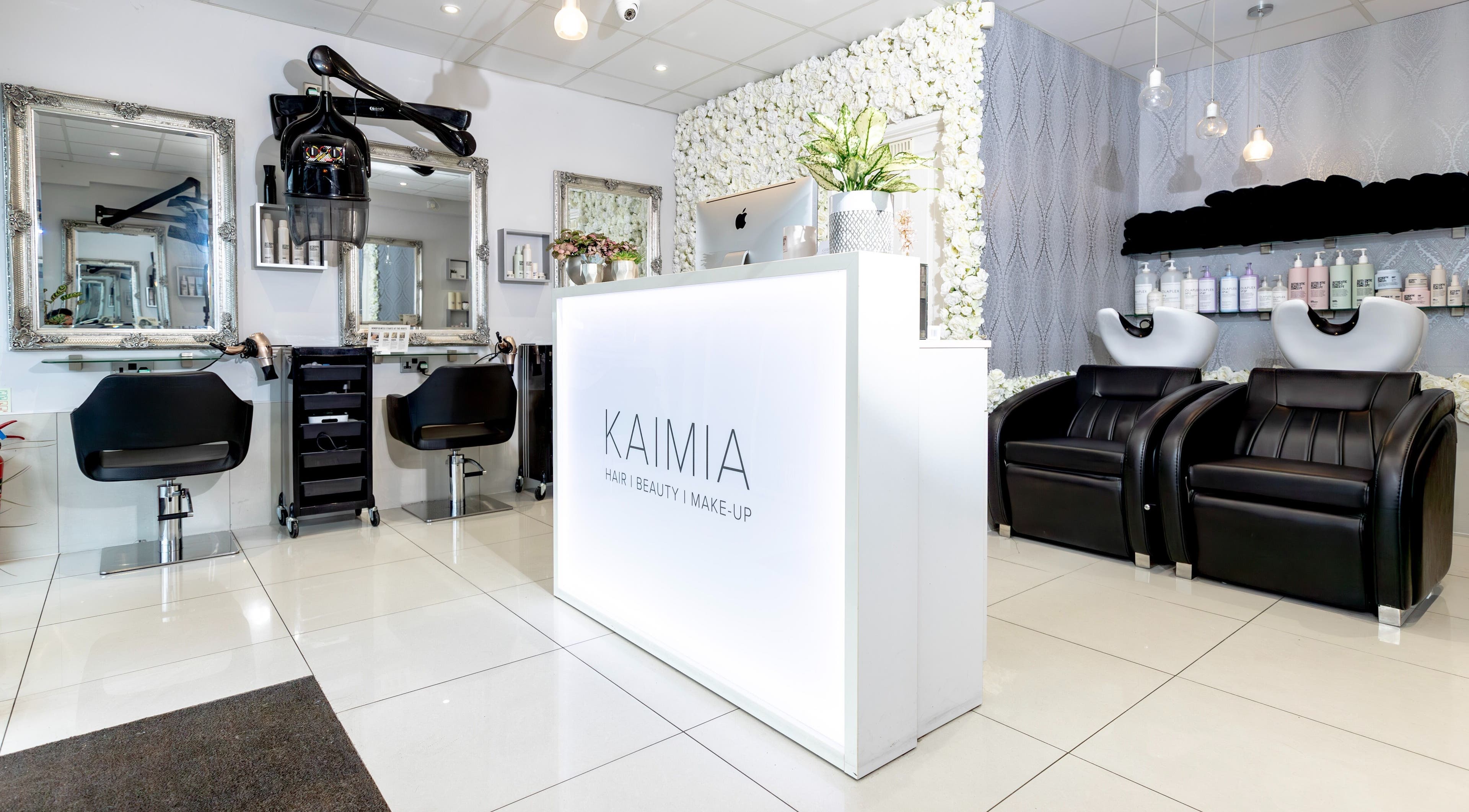 Modern salon interior of Kaimia in Hayes, England, GB with sleek chairs and stylish decor.