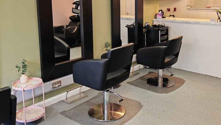Modern salon chairs and mirrors at Eden Hair Studio, Port Seton, Scotland, GB.