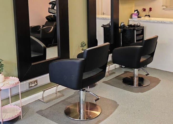 Modern salon chairs and mirrors at Eden Hair Studio, Port Seton, Scotland, GB.