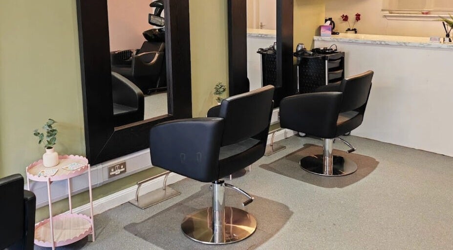 Modern salon chairs and mirrors at Eden Hair Studio, Port Seton, Scotland, GB.