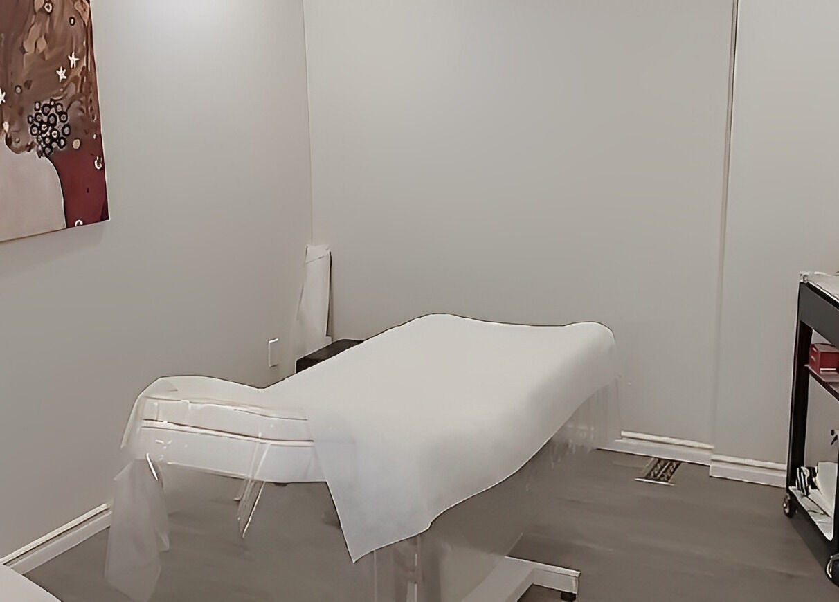 Tranquil treatment room at Beauty Destination Brow and Wax Bar, Burlington, Ontario, CA, featuring a cozy bed.