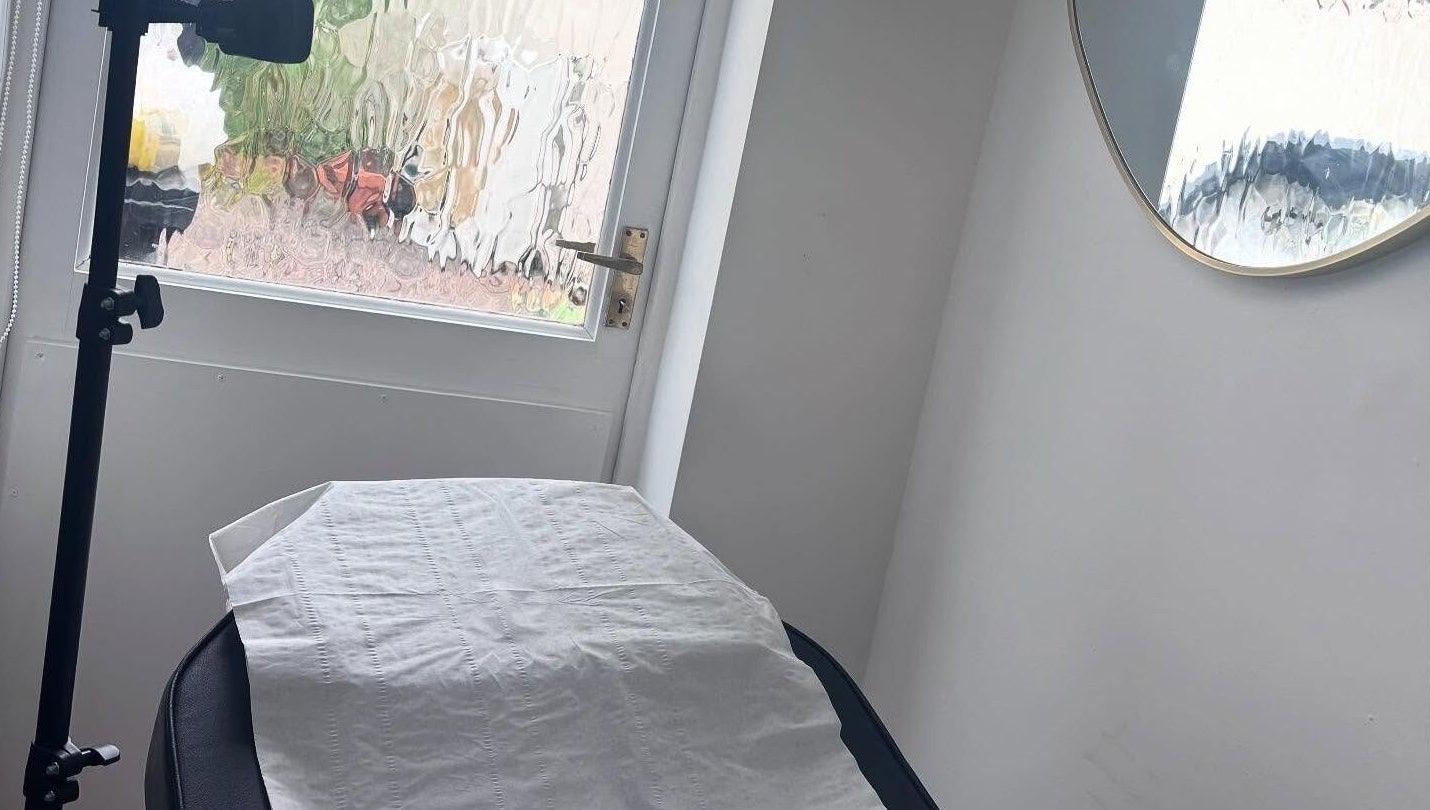 Glam by Tyler Marie serene treatment room in Oswestry, England, GB with relaxing ambiance.