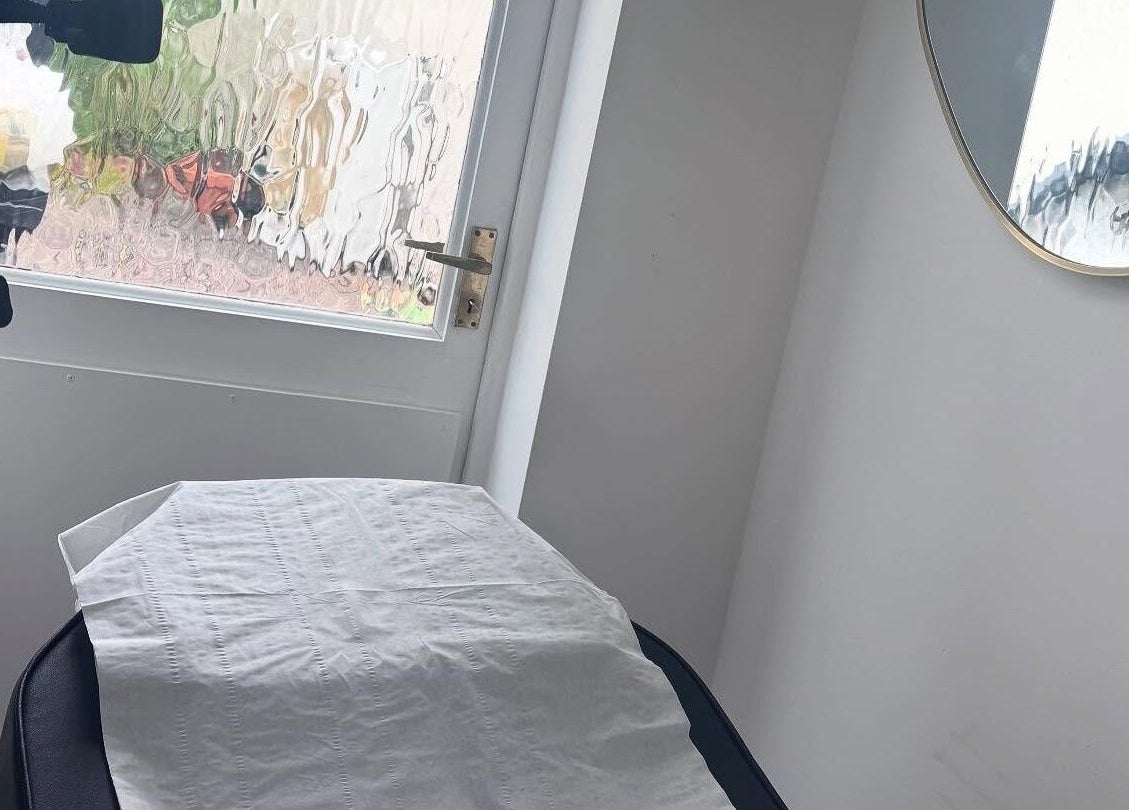 Glam by Tyler Marie serene treatment room in Oswestry, England, GB with relaxing ambiance.