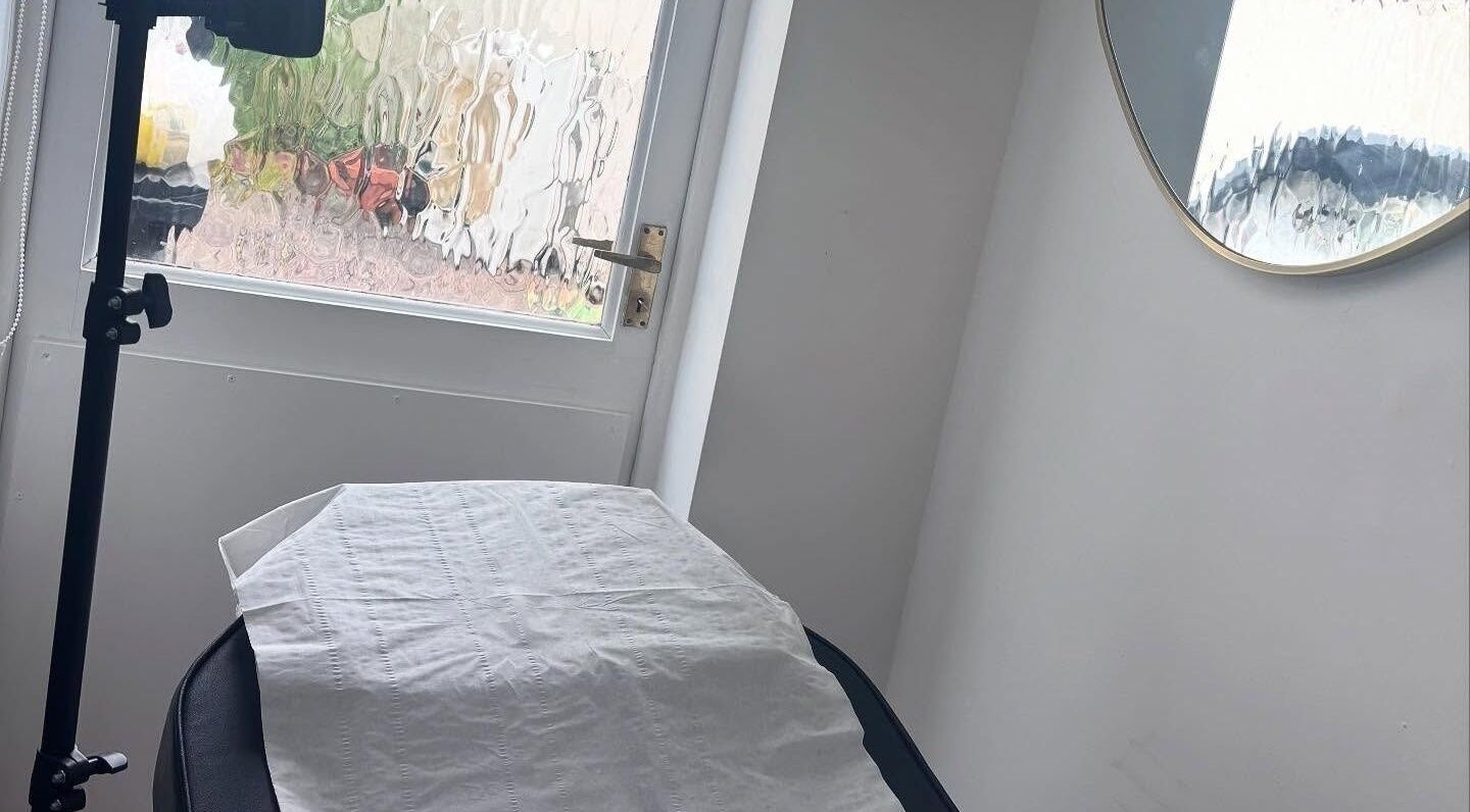 Glam by Tyler Marie serene treatment room in Oswestry, England, GB with relaxing ambiance.