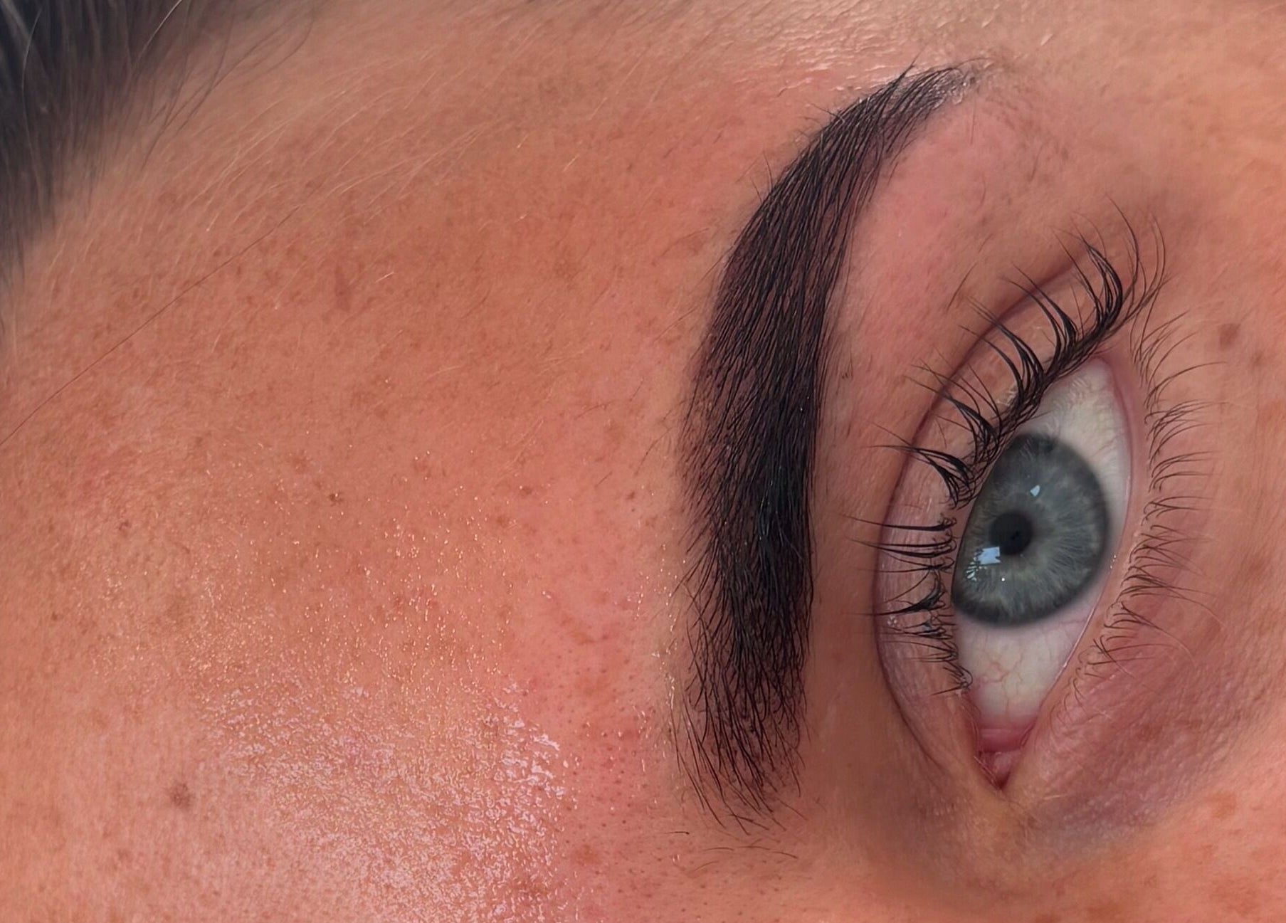 Close-up of a well-groomed eyebrow at Glam by Tyler Marie, Oswestry, England, GB.