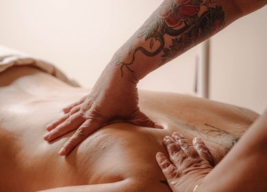 Massage session at Elle. Massage Therapy & Wellness Iloilo in Iloilo City, PH. Hands applying soothing pressure.
