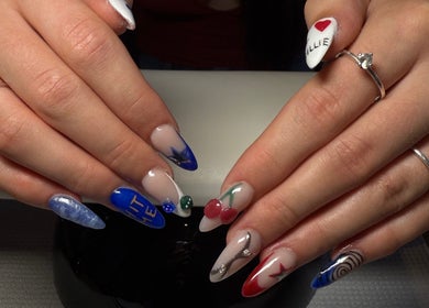 Artistic nail designs at The Beauty Lounge, Swindon, England, GB, showcasing vibrant colors and unique patterns.