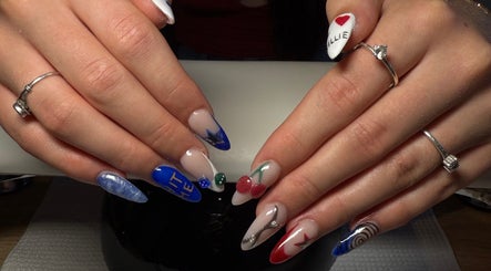 Artistic nail designs at The Beauty Lounge, Swindon, England, GB, showcasing vibrant colors and unique patterns.